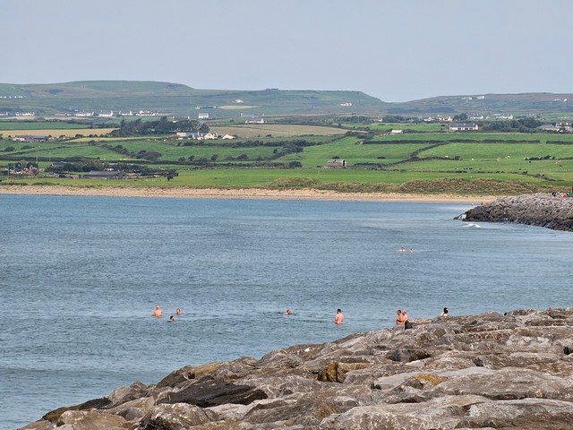 visible swell lines but the tide is too high for waves to break